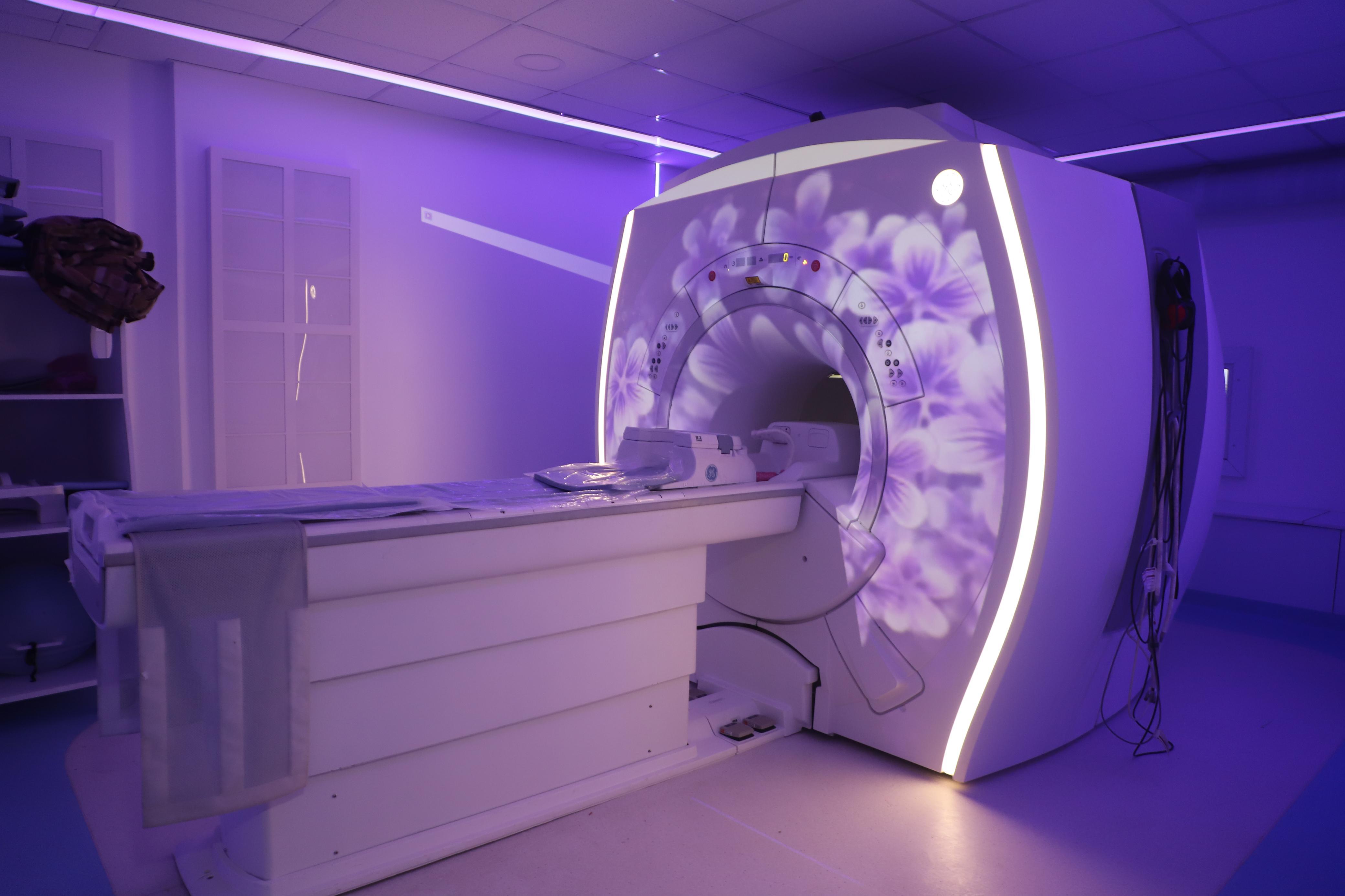 Advanced 3T MRI scanner with ambient lighting at Narula Diagnostics